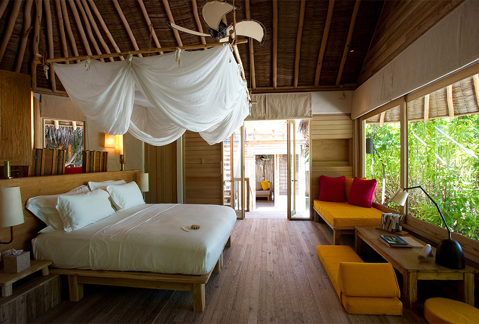 Six Senses Laamu 975x660_beach_villa_bedroom5_ssl