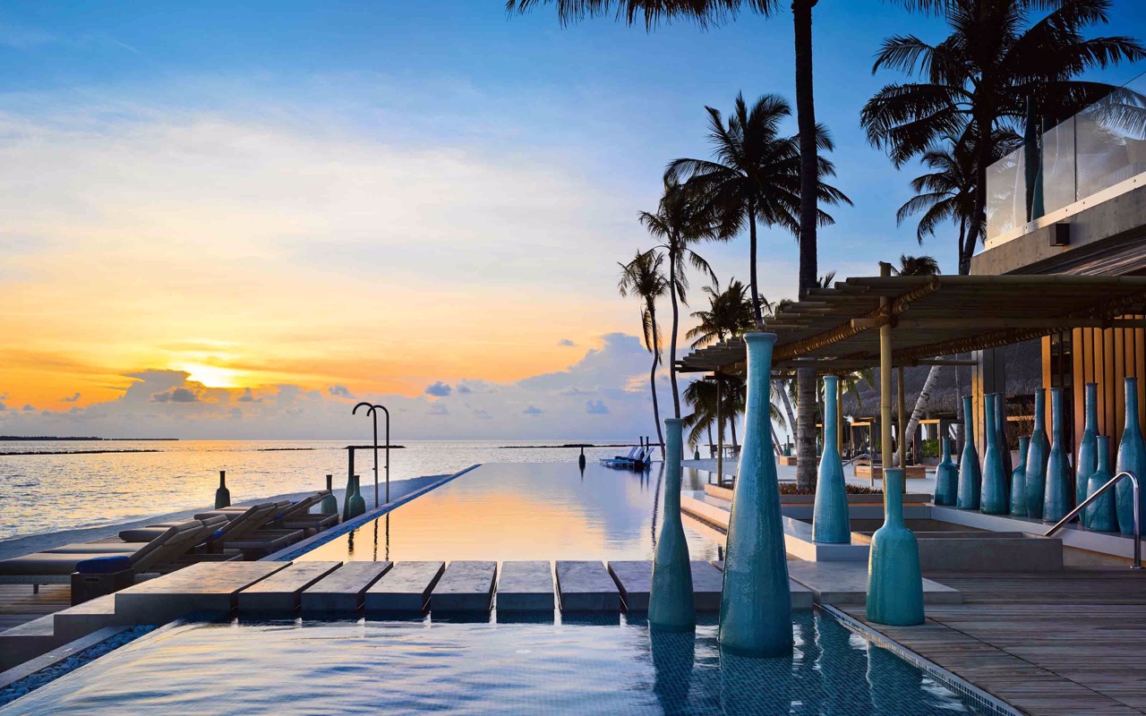 Velaa Private Island Maldives Main Pool Sunset